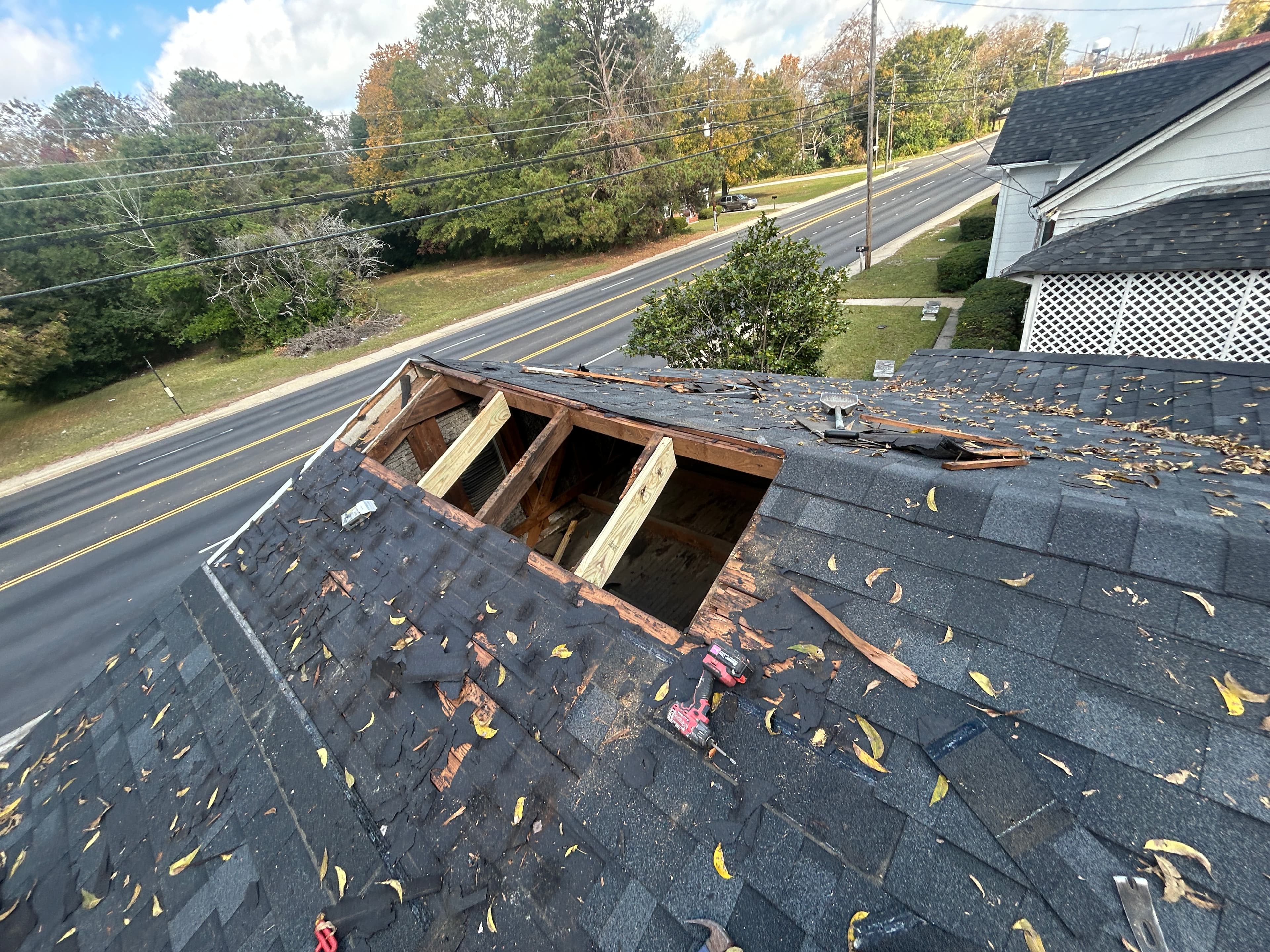 Before — storm damaged roof